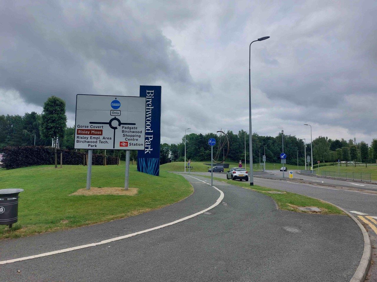 Birchwood bus lane -Signage at the exit of Birchwood Park leading to Birchwood Way